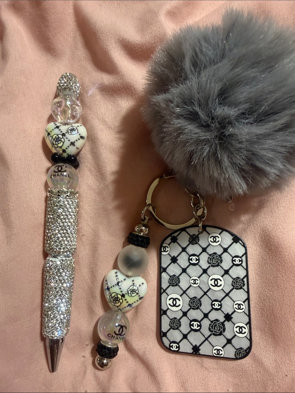 Black & white matching keychain and rhinestone pen with extra pen refill.